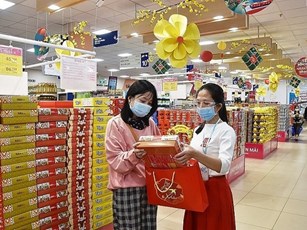 Sức mua dịp Tết tương đối thấp, lượng hàng dự trữ vượt cầu