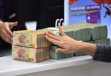 Chữa 'bệnh thừa tiền', ngân hàng đẩy mạnh cuộc đua giảm lãi suất cho vay