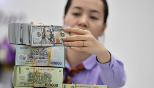 Lý do VNĐ giảm giá dù đồng USD suy yếu