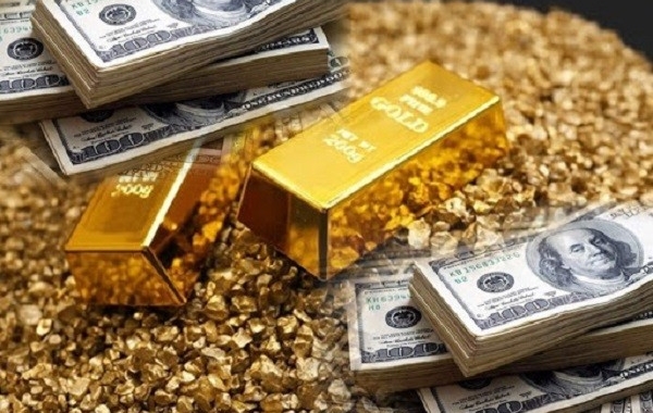 Đồng USD tăng vọt, giá vàng chạm đáy trong vòng 9 tháng